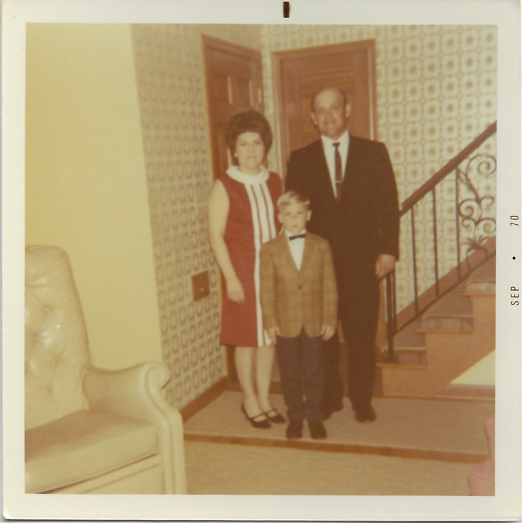 Rita & Frank with Jim First Communion.png