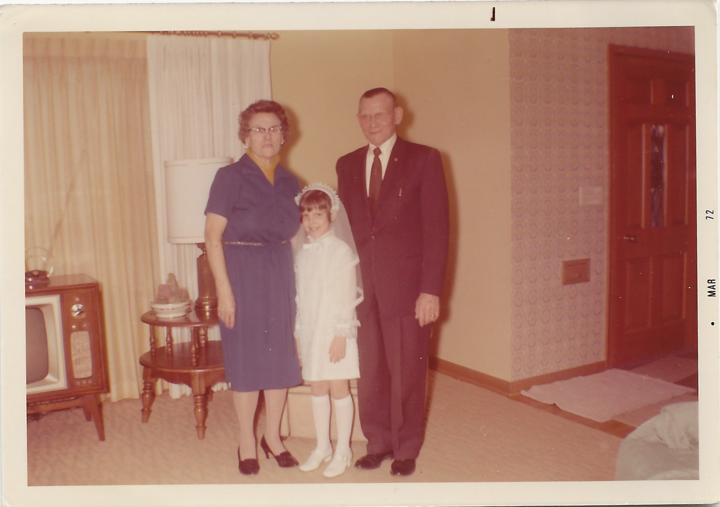 Mary & Ben with Cathy First Communion.png