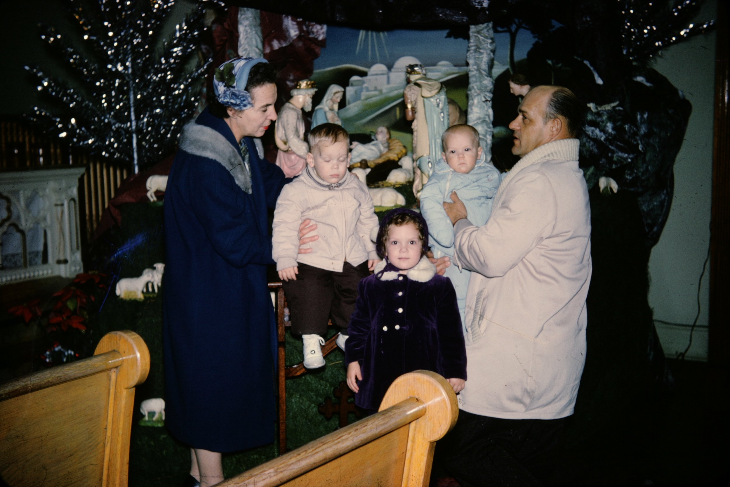 Anna, Mark, Annie, Jim, & Frank in Front of the Nativity.JPG