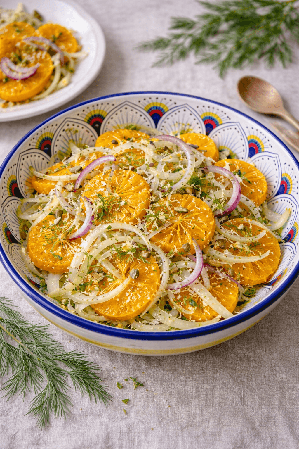 Italian fennel and orange salad served in handpainted Intreccio Bowl made in Deruta Italy.