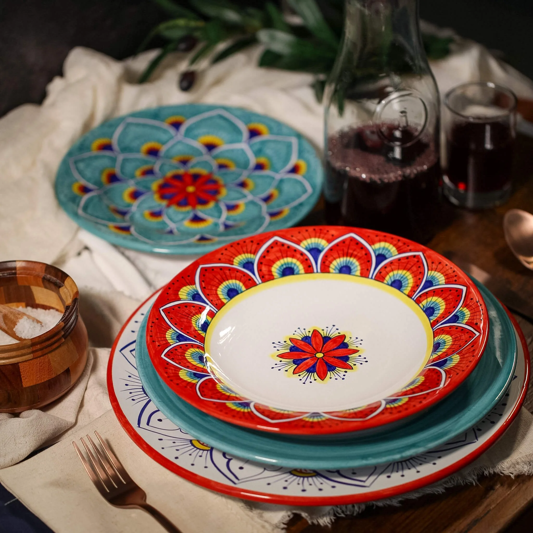 Intreccio hand-painted Italian ceramic place setting with red and teal pattern