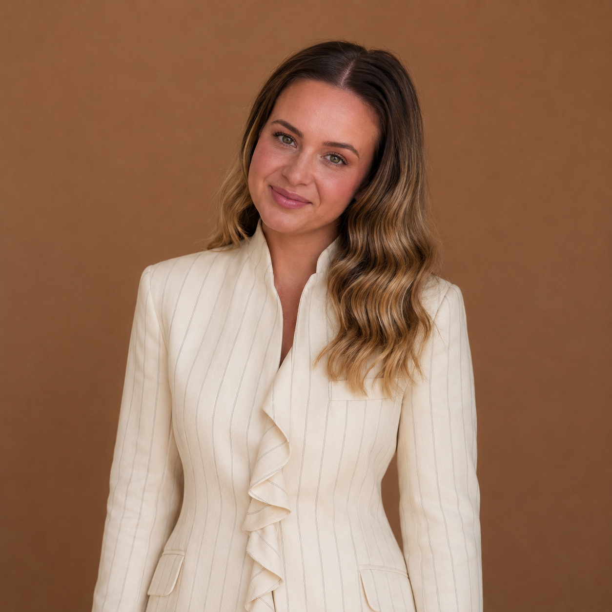 Portrait of brunette woman in blazer
