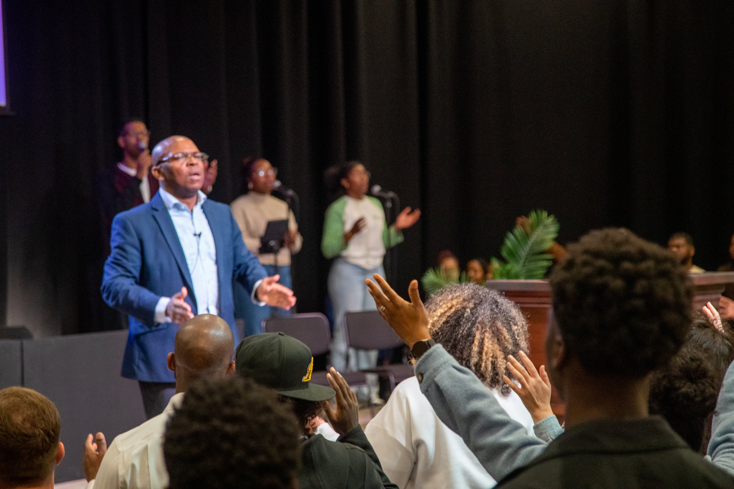 Pastor Success Altar call candid.jpg