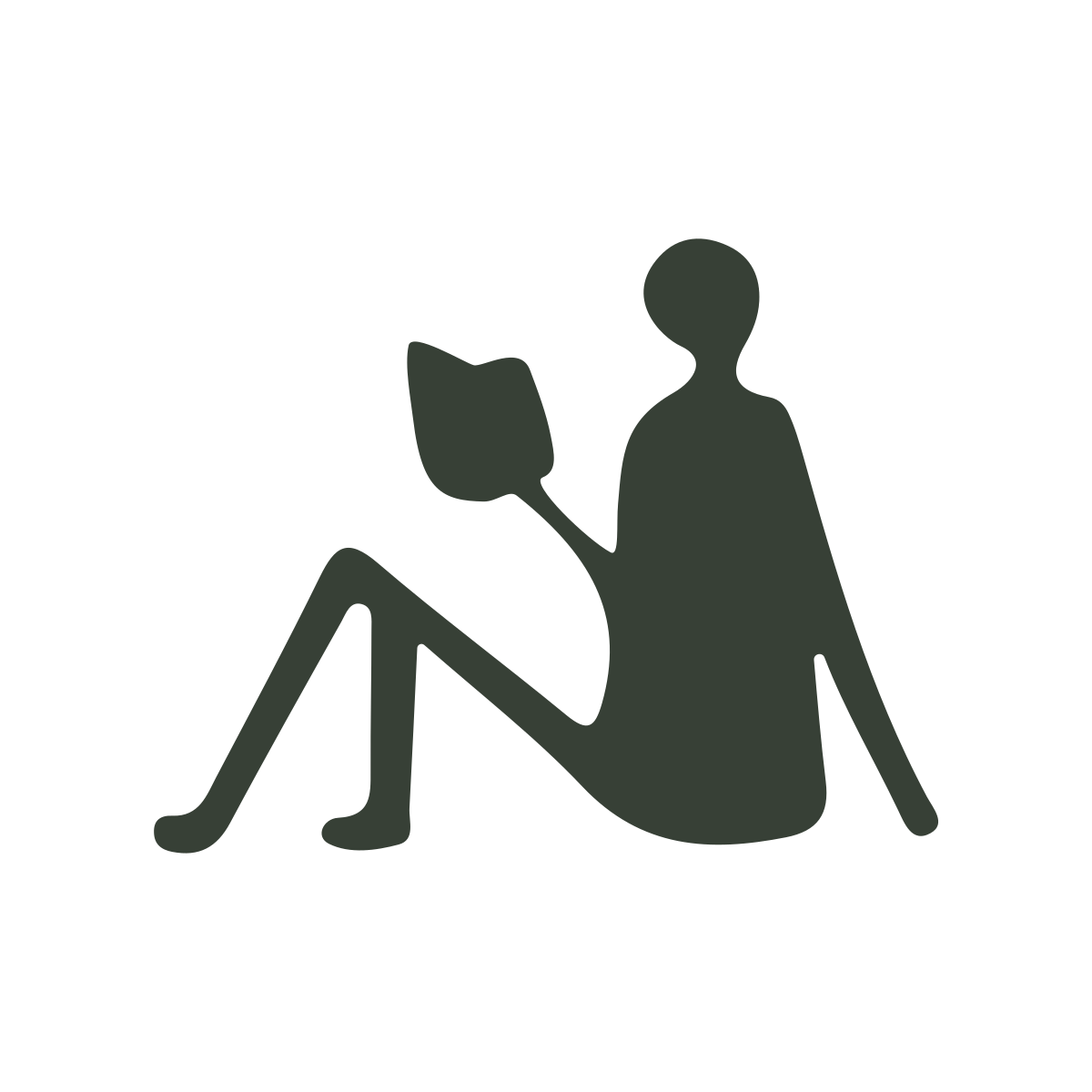 Silhouette of a person reading a book to a child sitting on the ground
