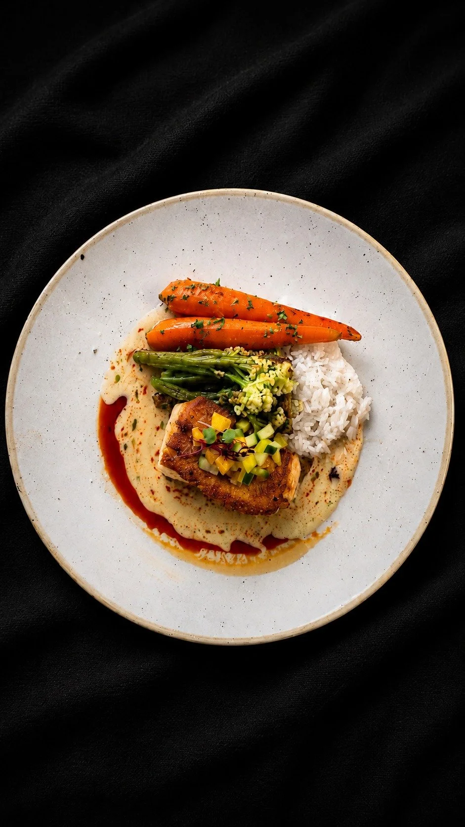 Fresh, vibrant, and thoughtfully crafted by Chef Matt Geiger.

Chef Matt starts with perfectly seared Yellowtail Snapper, then layers in bright citrus flavors with a crisp cucumber relish and finishes the dish with a silky yuzu beurre blanc. Paired w