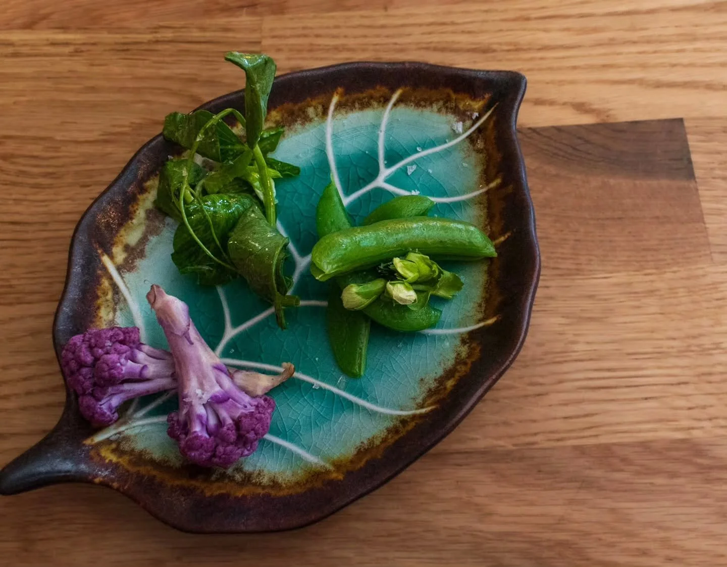 our market plate served for sunday tea service captures the essence of the season's produce. fruits or vegetables are prepared as simply as possible to showcase the natural beauty of what was grown. we go to the farmer's market and pick whatever stri
