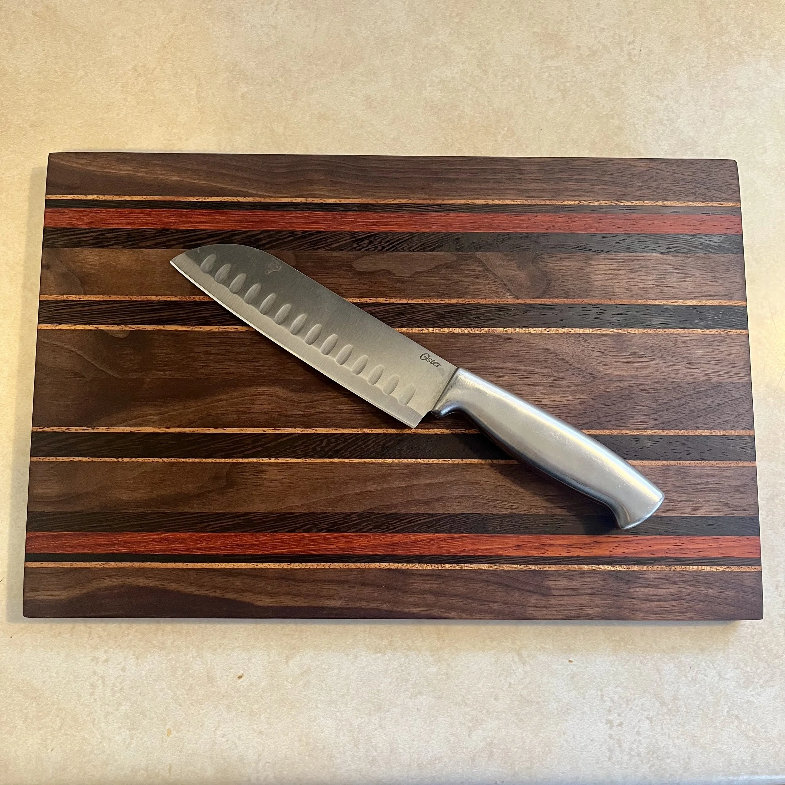 Vibrant Padauk Stripe Cutting Board