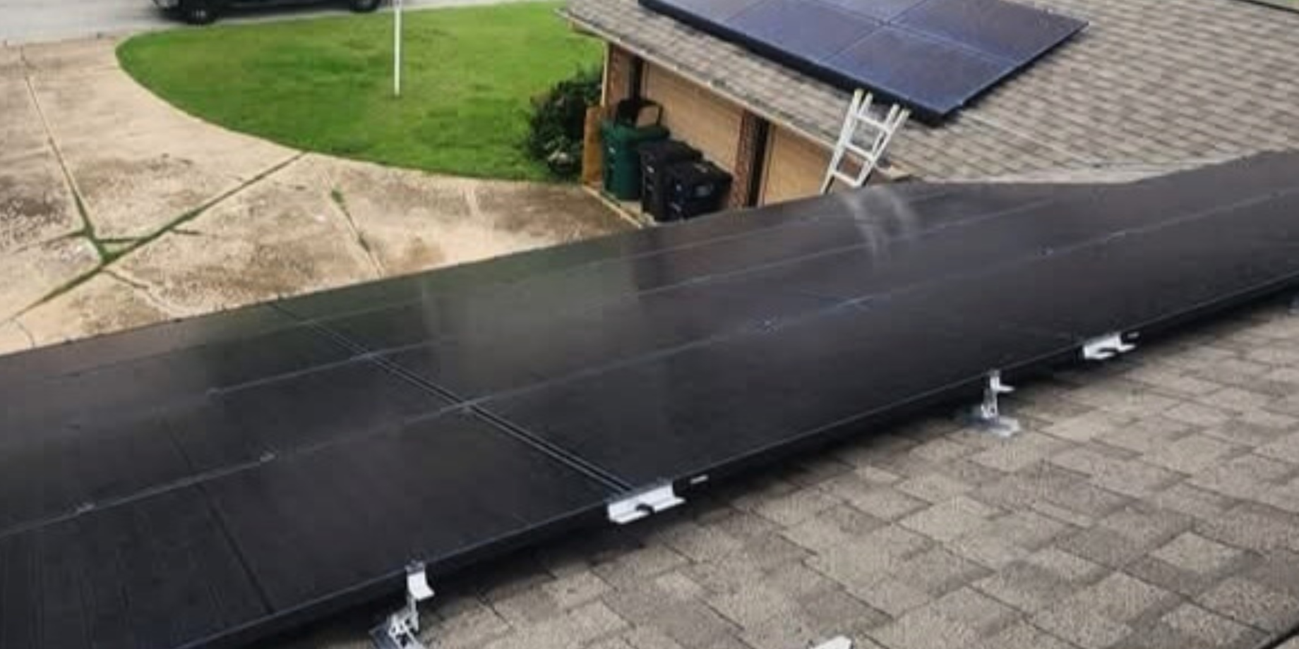 Photovoltaic solar panels installed on a house roof.