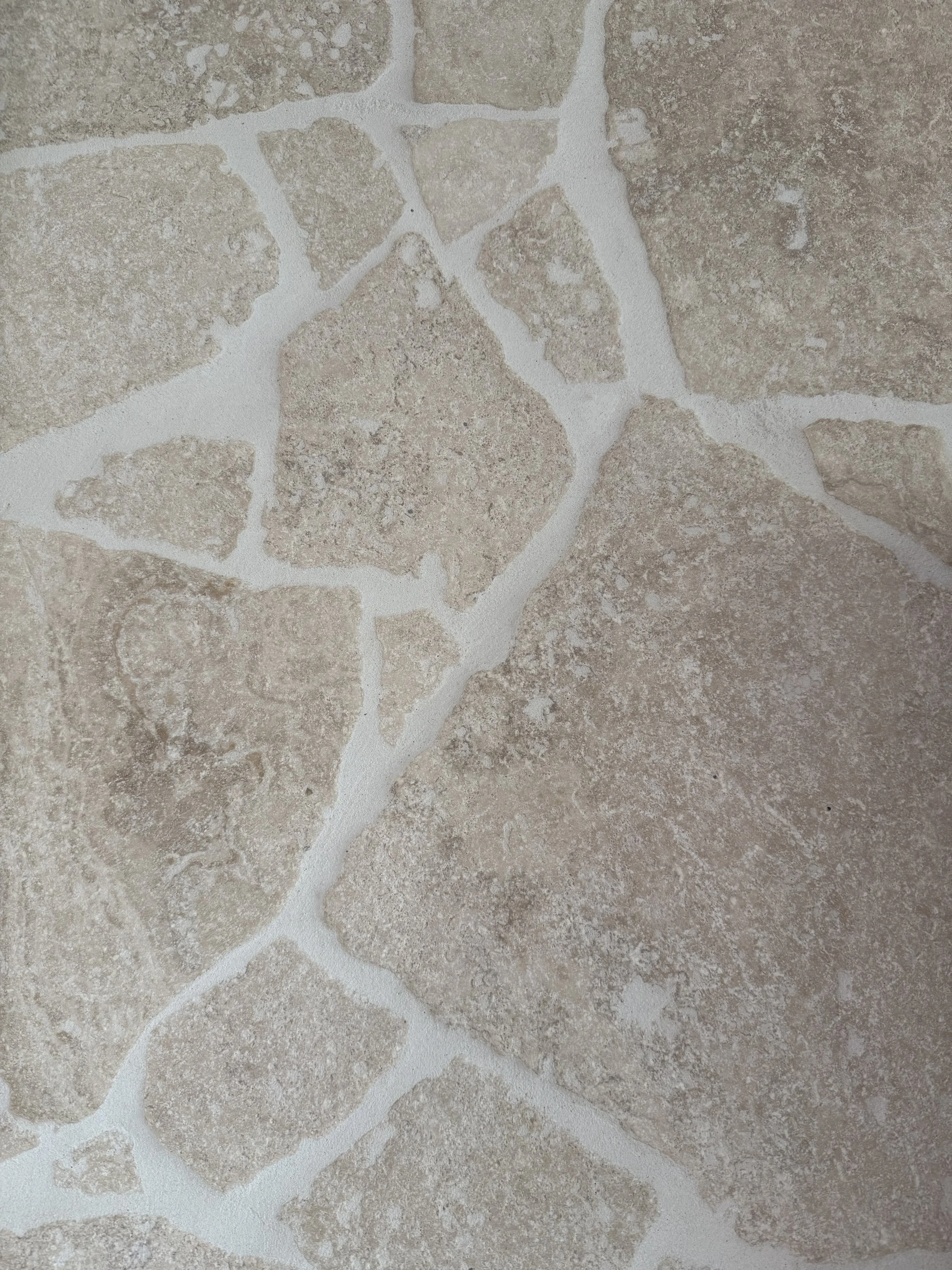 Natural stone feature wall that is grouted and installed by Haven Tiling & Stone Pty Ltd.