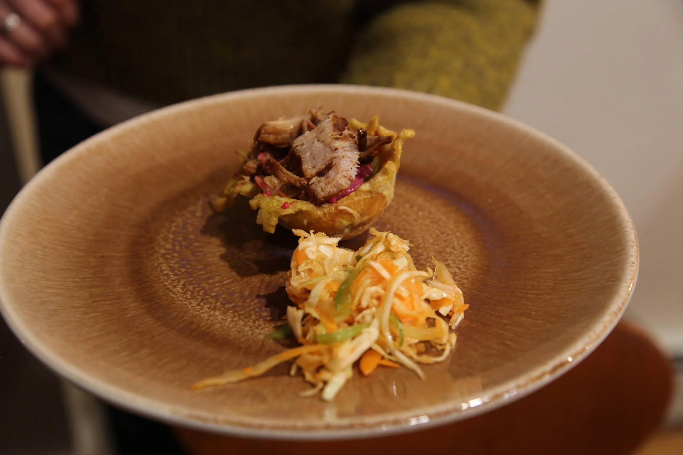 A delicious looking plantain cup with roasted pork