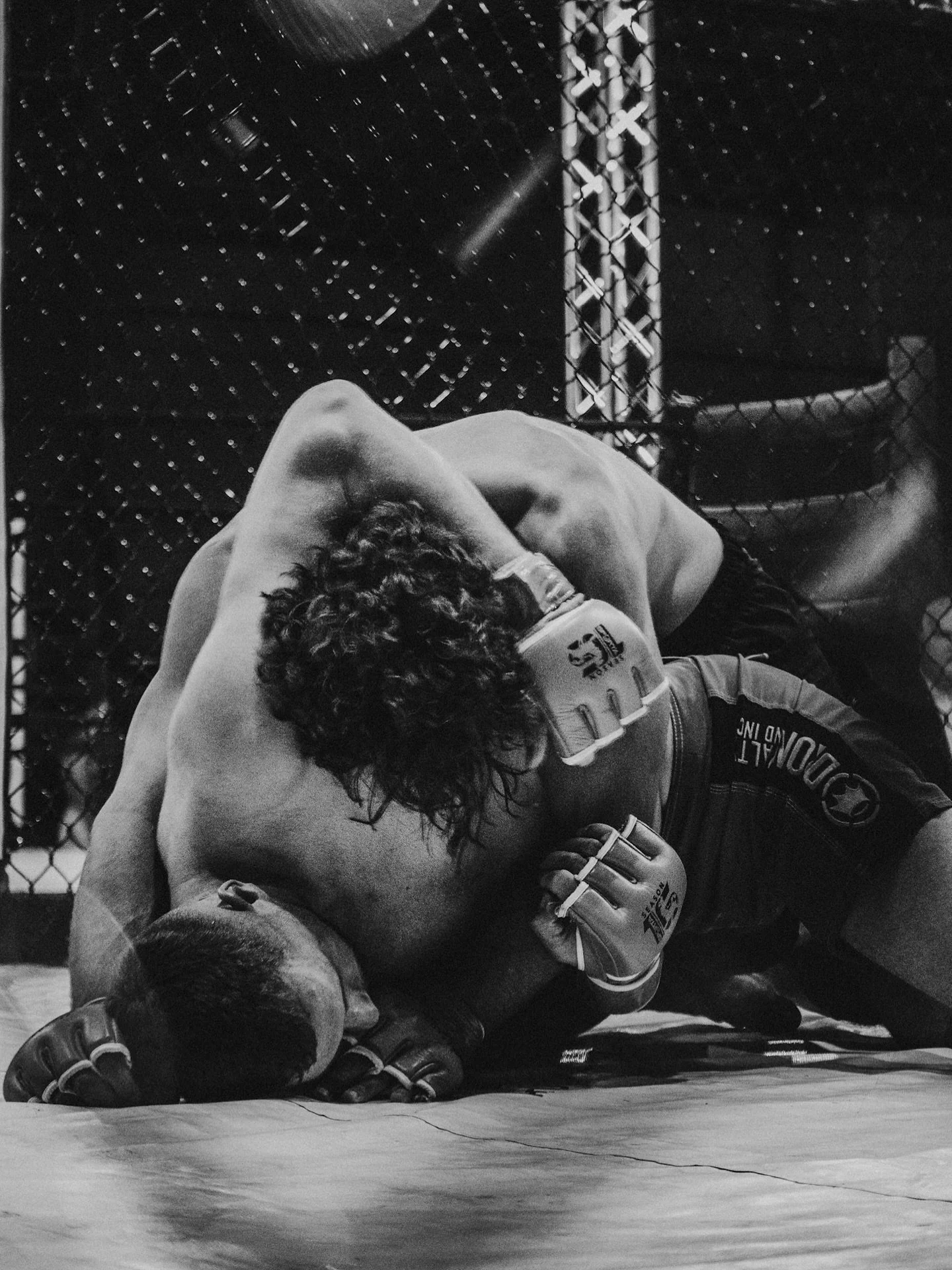 The art of patience, pressure, and precision. A little action shot from the cage 😮&zwj;💨

#SpartaFightNight #MMA #FightNight #CombatSports #MMAPhotography #FightLife #BlackAndWhitePhotography #SportsPhotography #MMAFighter #InTheCage #FightVibes #A