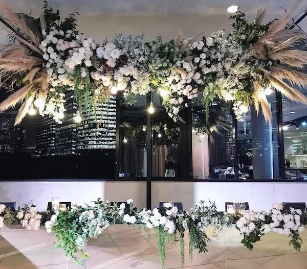 table garland with flowers for hire - melbourne event florals.jpg