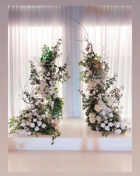 pair of towers with florals - melbourne event florals.jpg