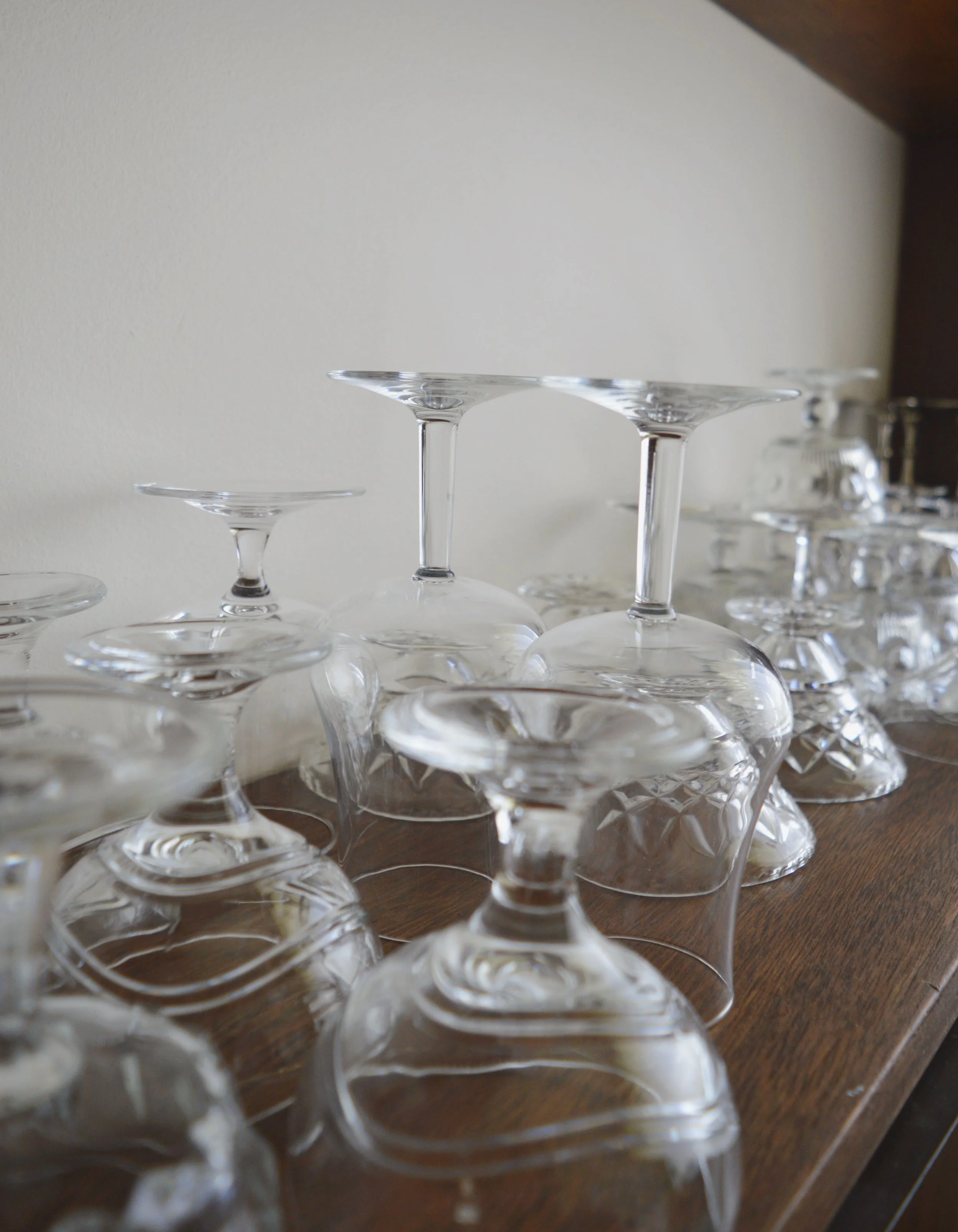 Collection of reclaimed vintage style glassware, including wine, cocktail and beer glasses