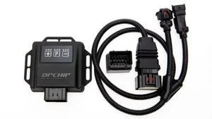 Diesel performance chip with wiring harness and connectors, photographed on white by Cole Studios for product listing.