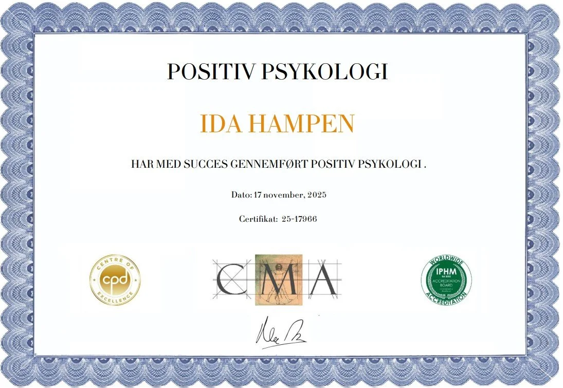 Certificate of achievement for Ida Hampen in positive psychology, dated November 17, 2025, with official seals and signatures, decorative blue border.