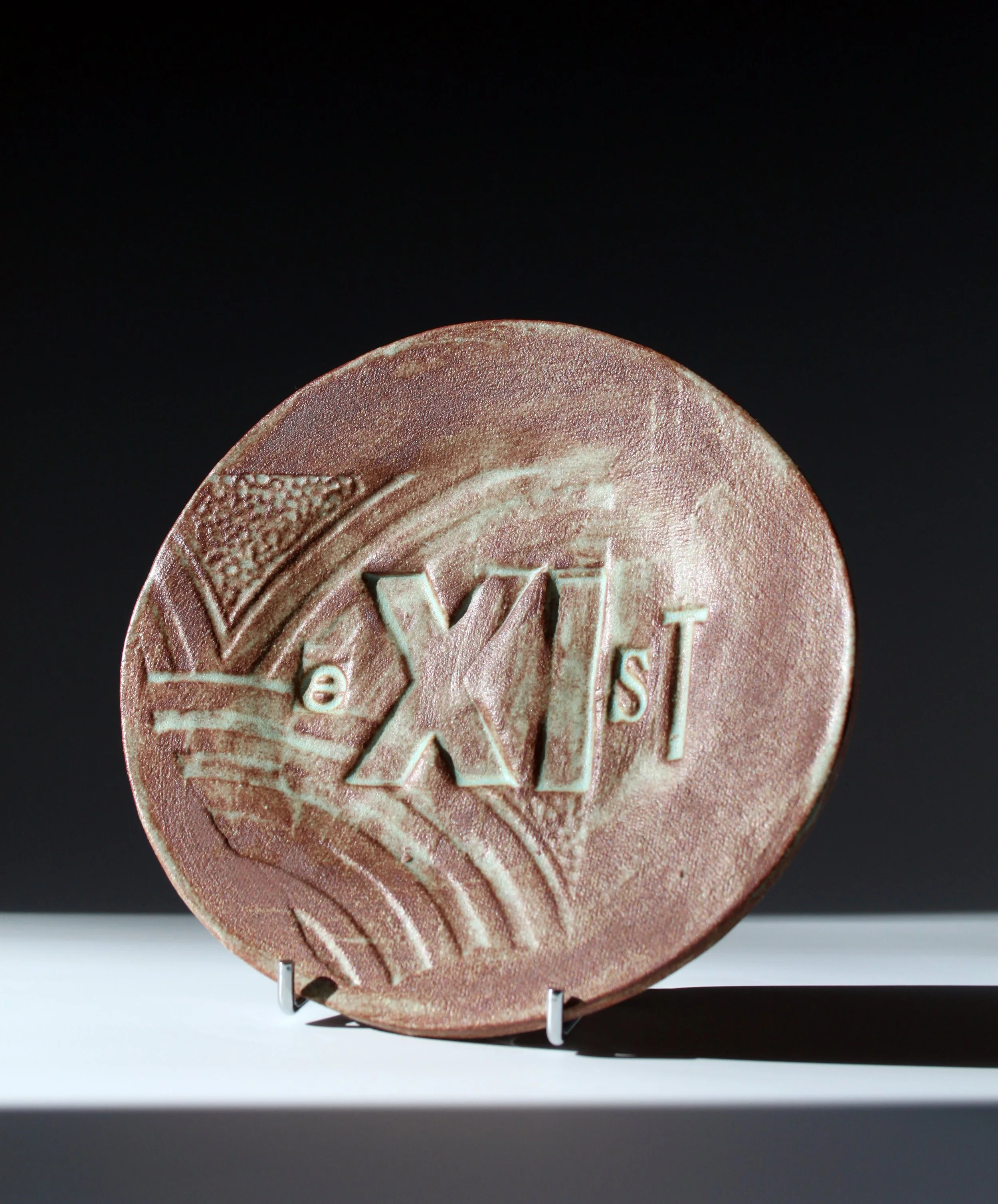 Small Text Plate: Exist