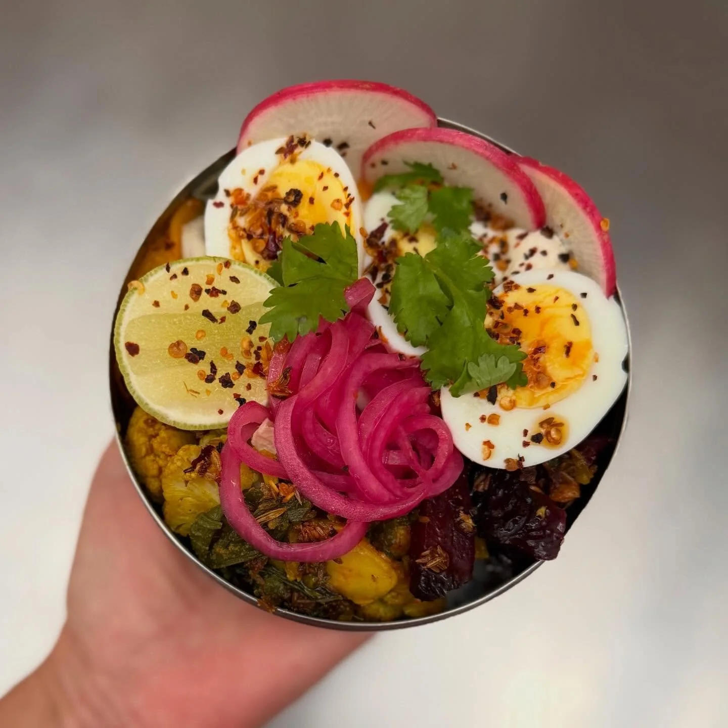Resting on bed of fluffy basmati rice we load up spiced turmeric cauliflower, sticky date beets, mathanga pumpkin, organic eggs, pink pickles, whipped cashew cr&egrave;me, chipotle chilli oil and herbs to create a flavour bomb in each bite! Wanna try