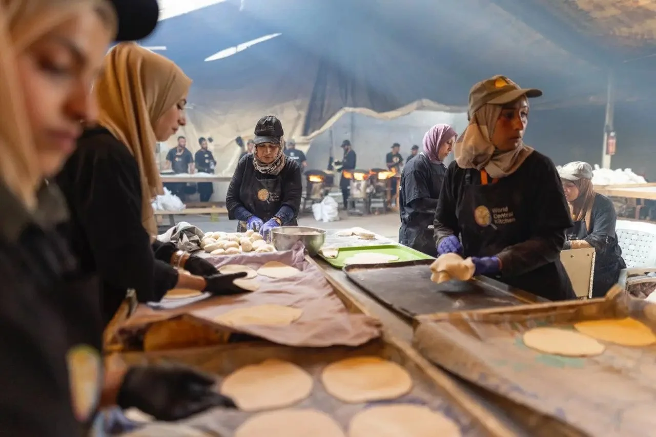 Volunteers prepare hot meals in Gaza
