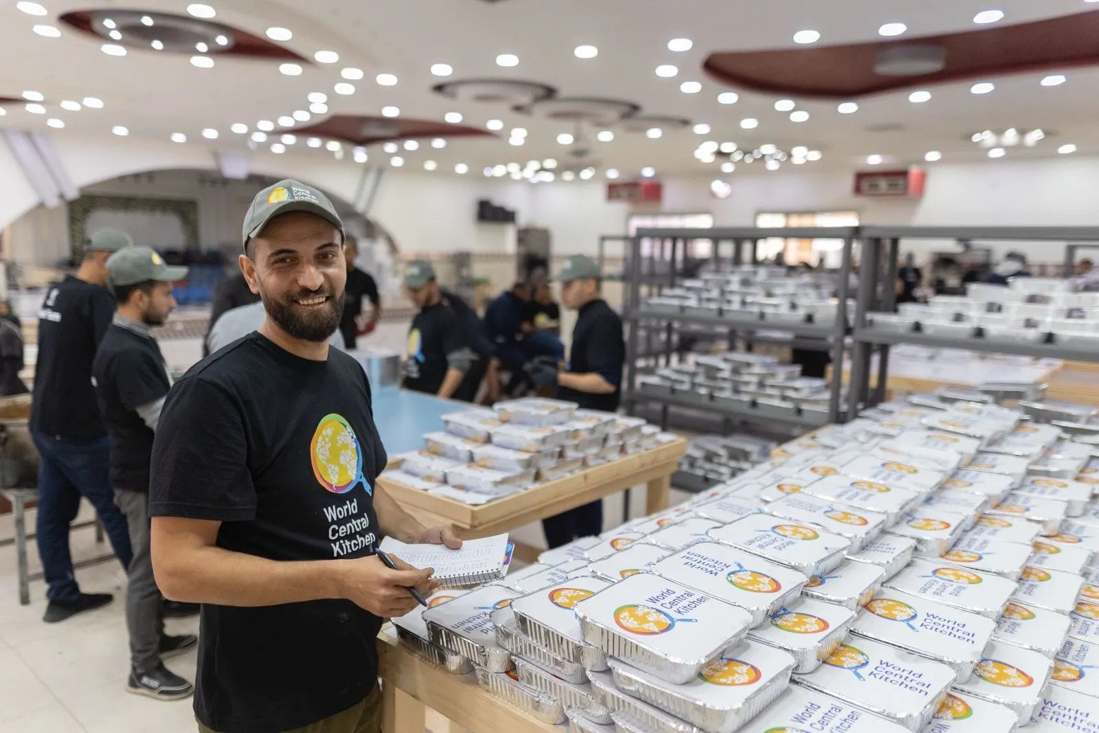 A volunteer in World Central Kitchen's kitchen in Gaza preparing hot meals