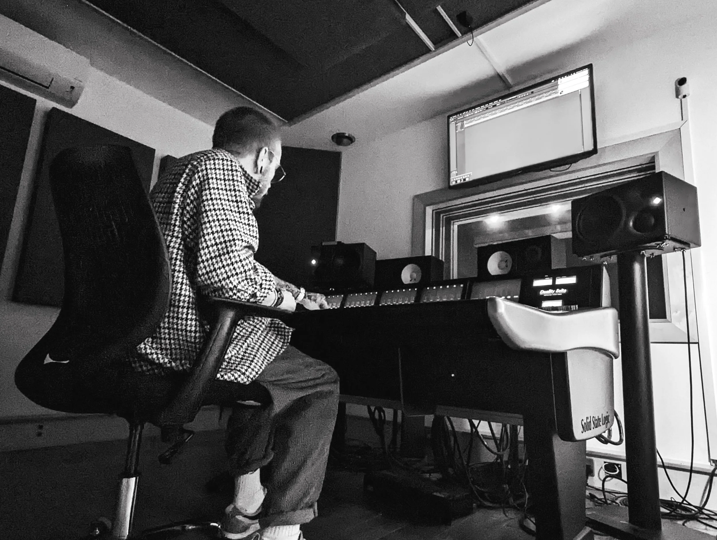 Andy in the studio with a SSL Duality Delta Desk