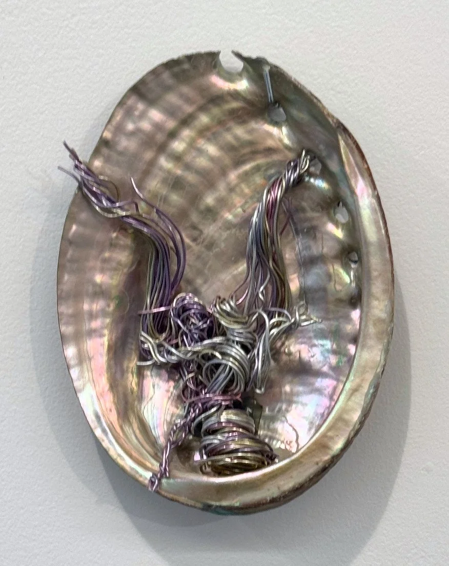 Pablo Garcia-Lopez, "Iridescent angel inside an abalone shell"