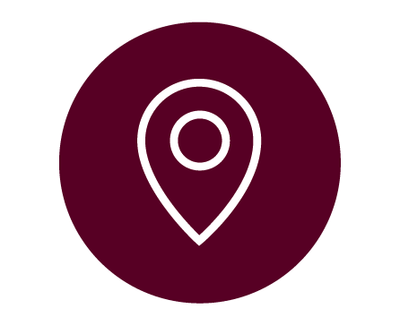 Standort-Icon mit Pin auf lila Hintergrund.