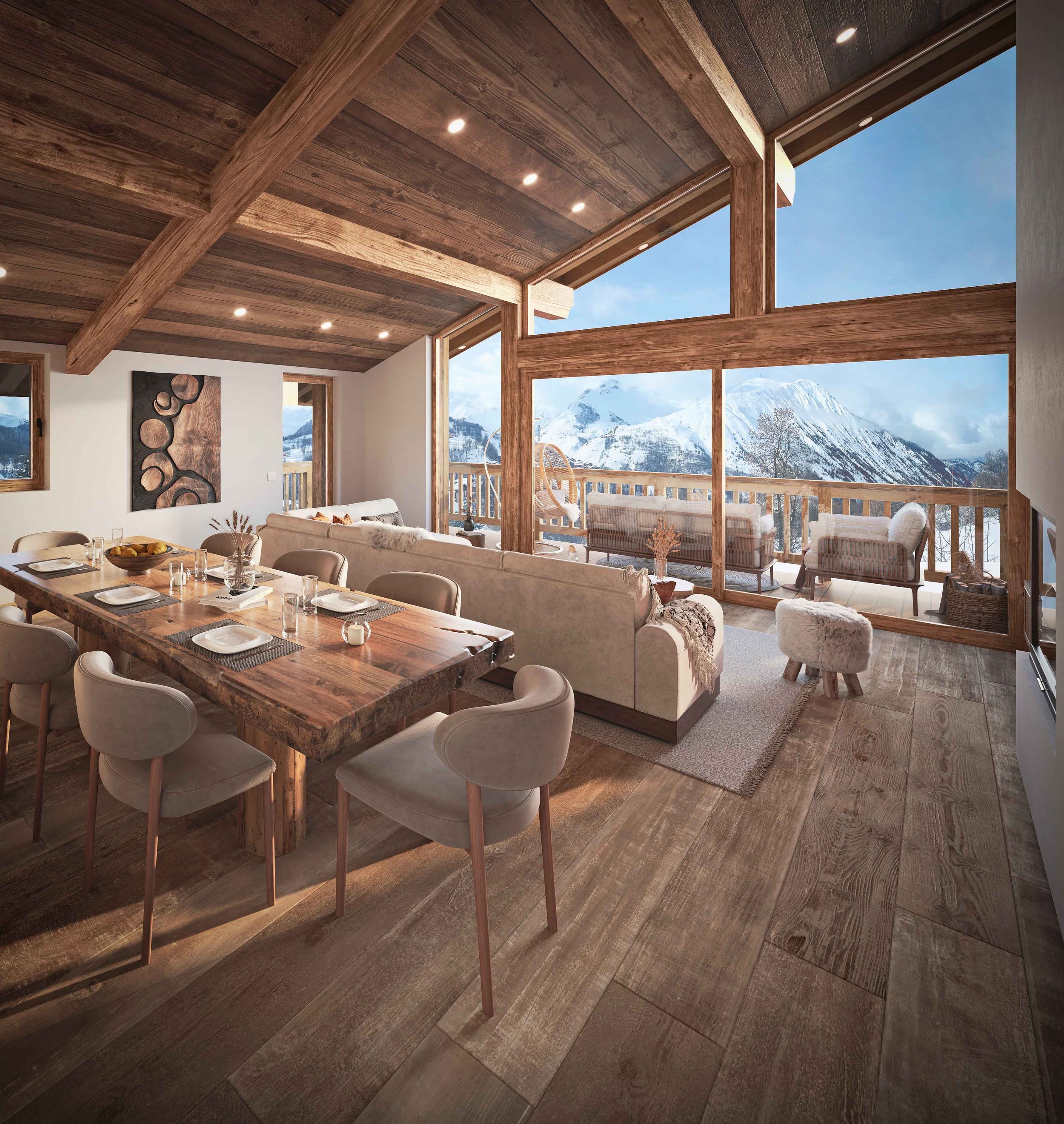 Salon haut de gamme avec vue panoramique sur les montagnes depuis un appartement à vendre à Saint-Martin-de-Belleville, commercialisé par l'agence immobilière HOME SUMMIT.