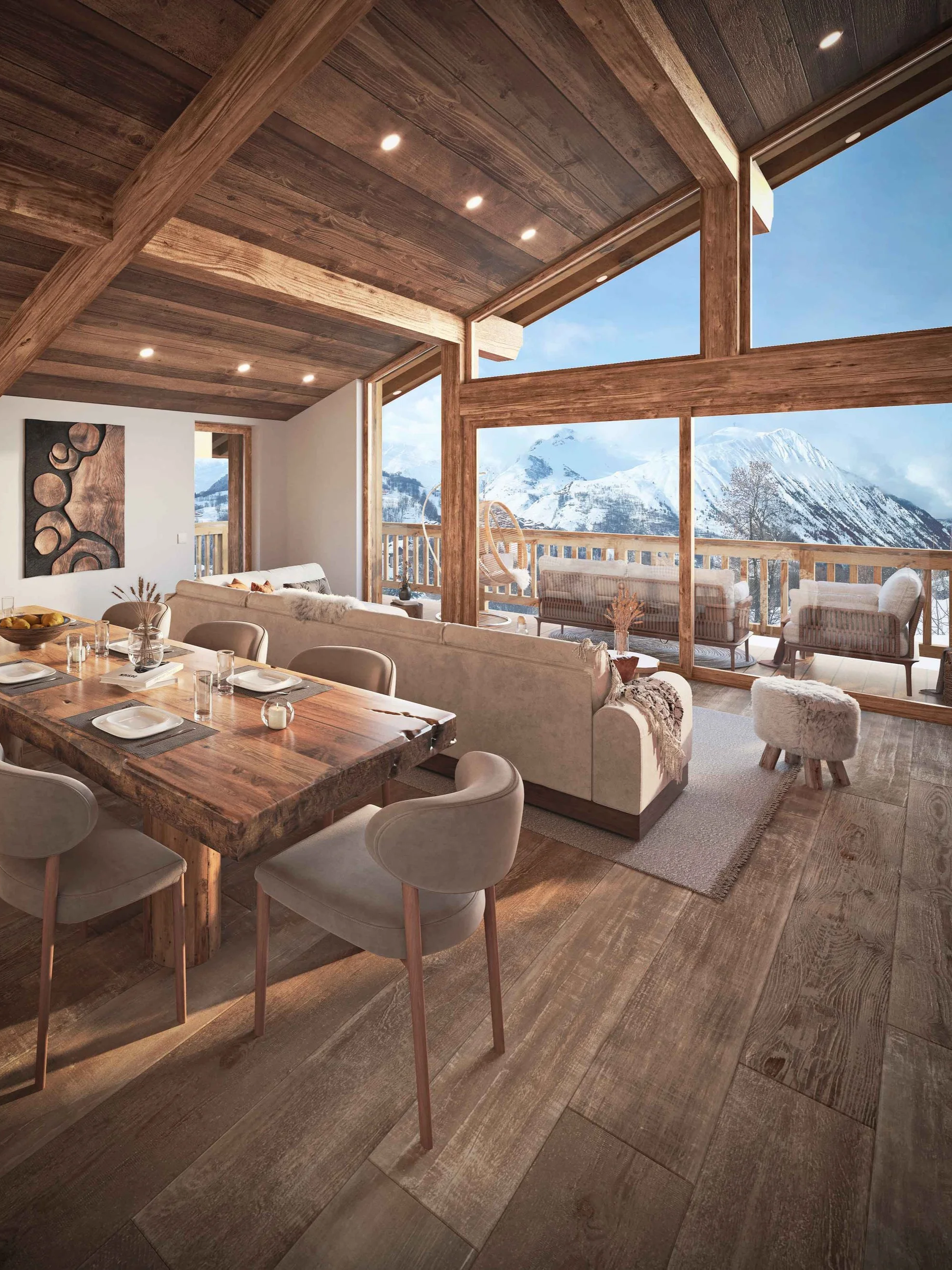 Penthouse haut de gamme proposé à la vente par HOME SUMMIT, avec vaste séjour baigné de lumière et vue panoramique sur les montagnes.