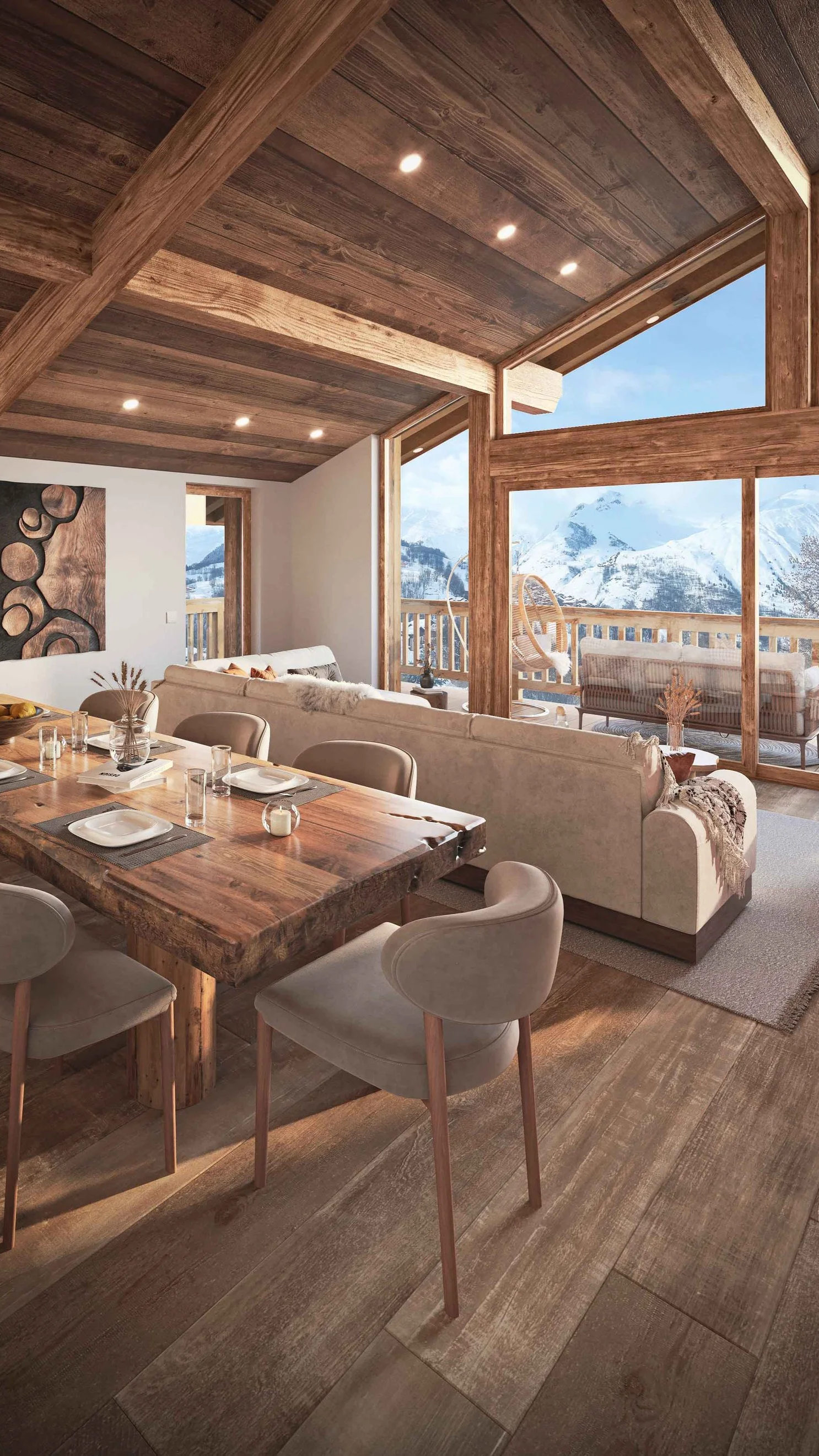 Pièce de vie lumineuse avec terrasse et vue sur les sommets alpins dans un appartement de prestige à vendre à Saint-Martin-de-Belleville avec HOME SUMMIT.