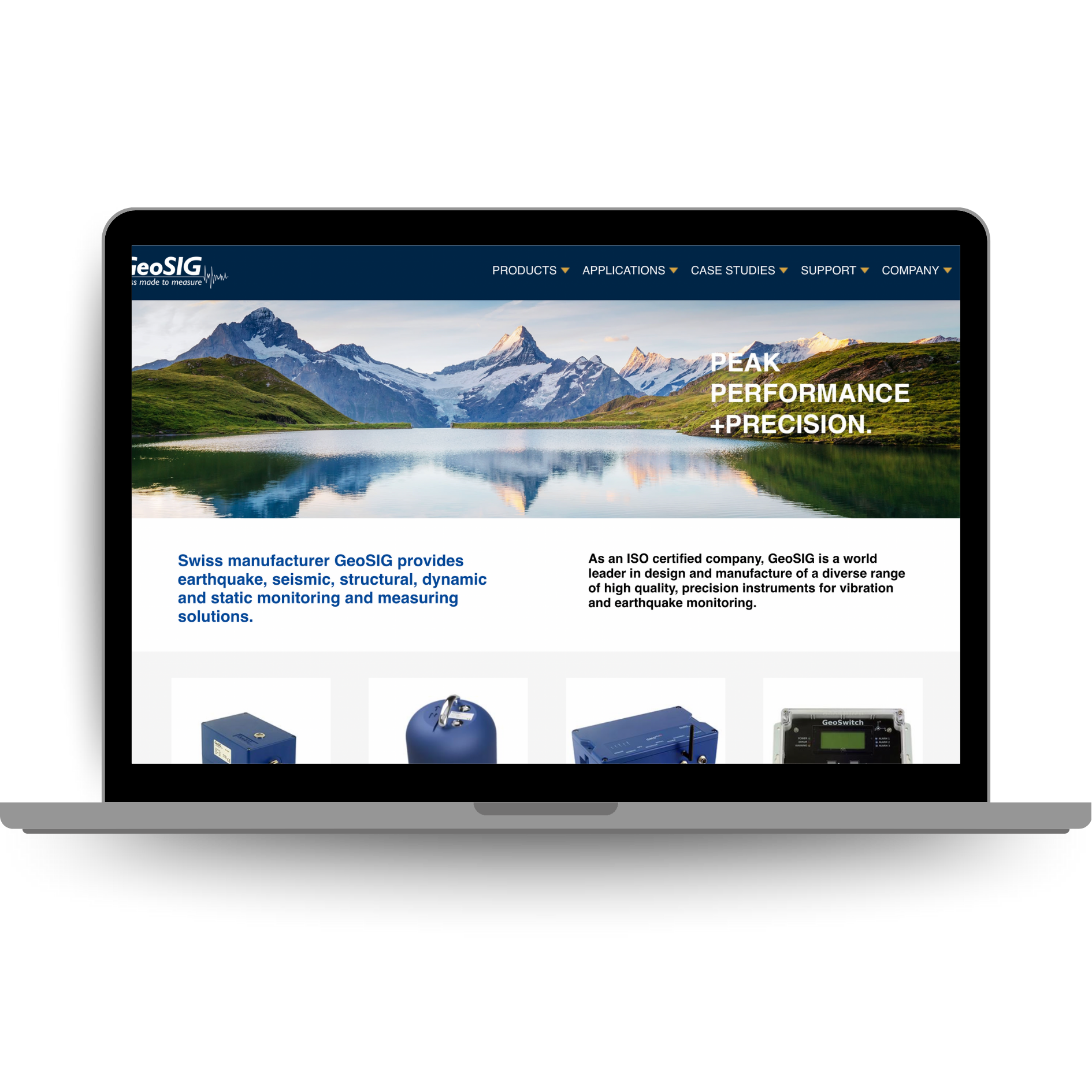 Laptop displaying the GeoSIG website highlighting Swiss-made earthquake, vibration, and structural monitoring solutions.