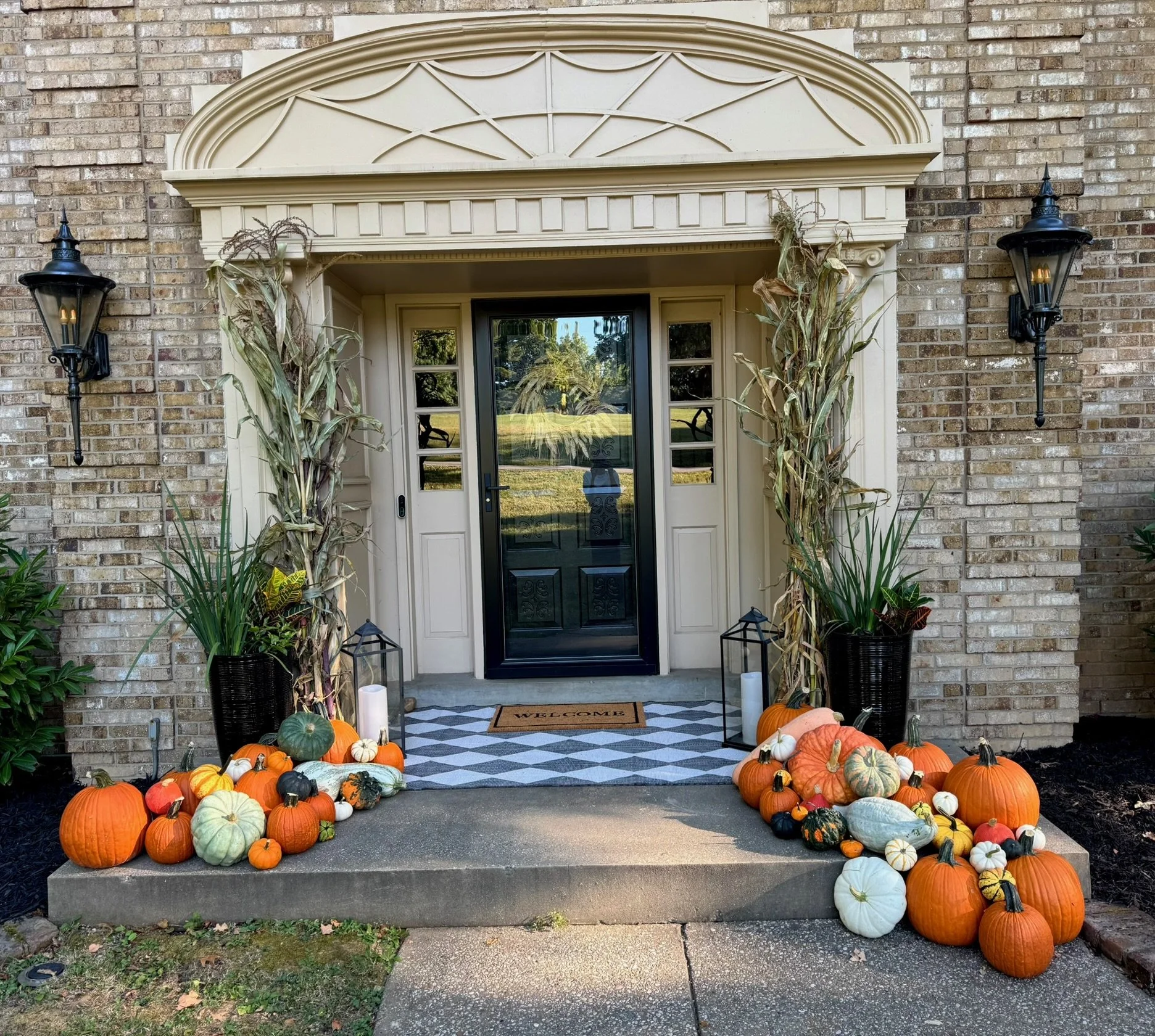 Fall porch decorating with pumpkins and mums in Louisville KY