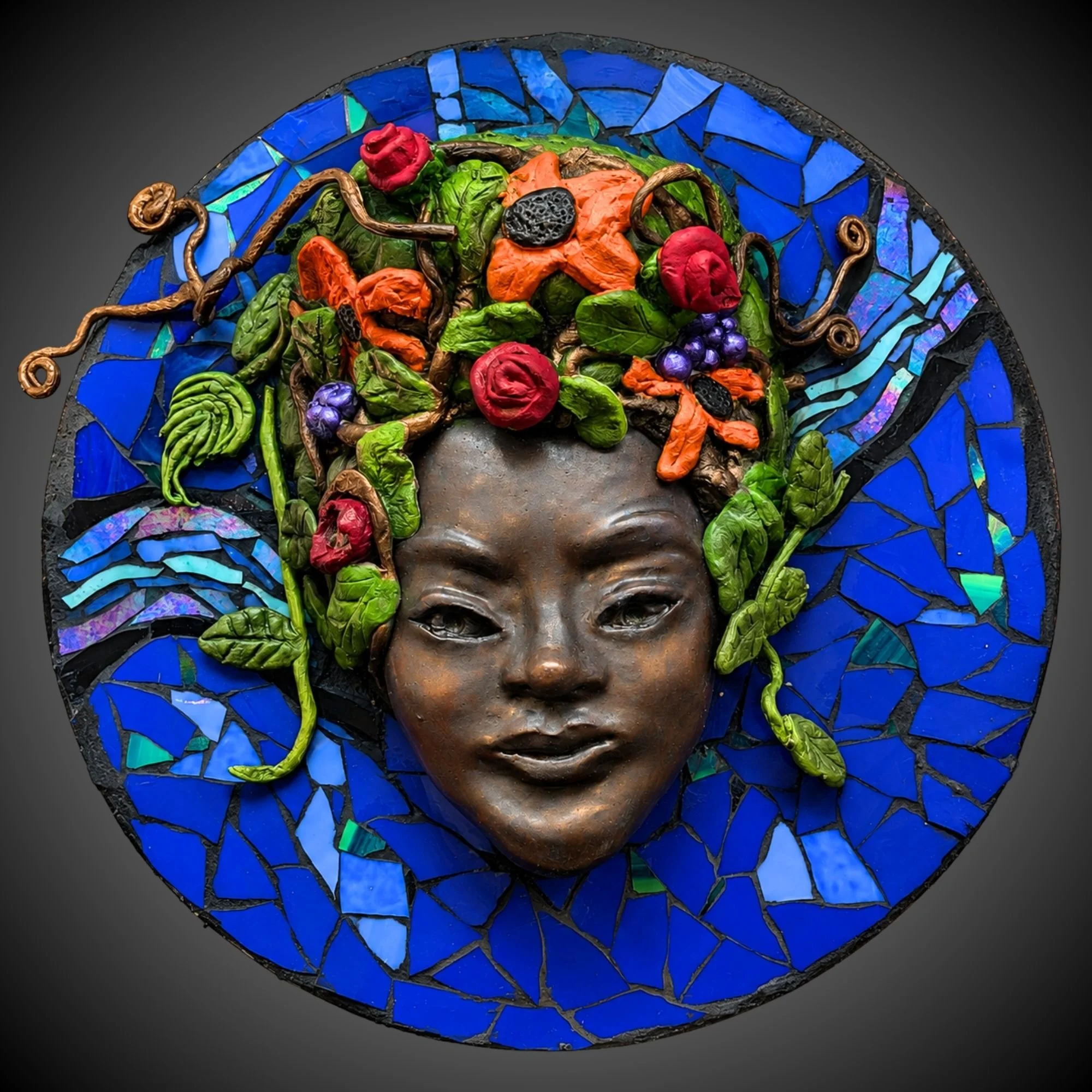 Earth (Grounding), ceramic face with stained-glass mosaic