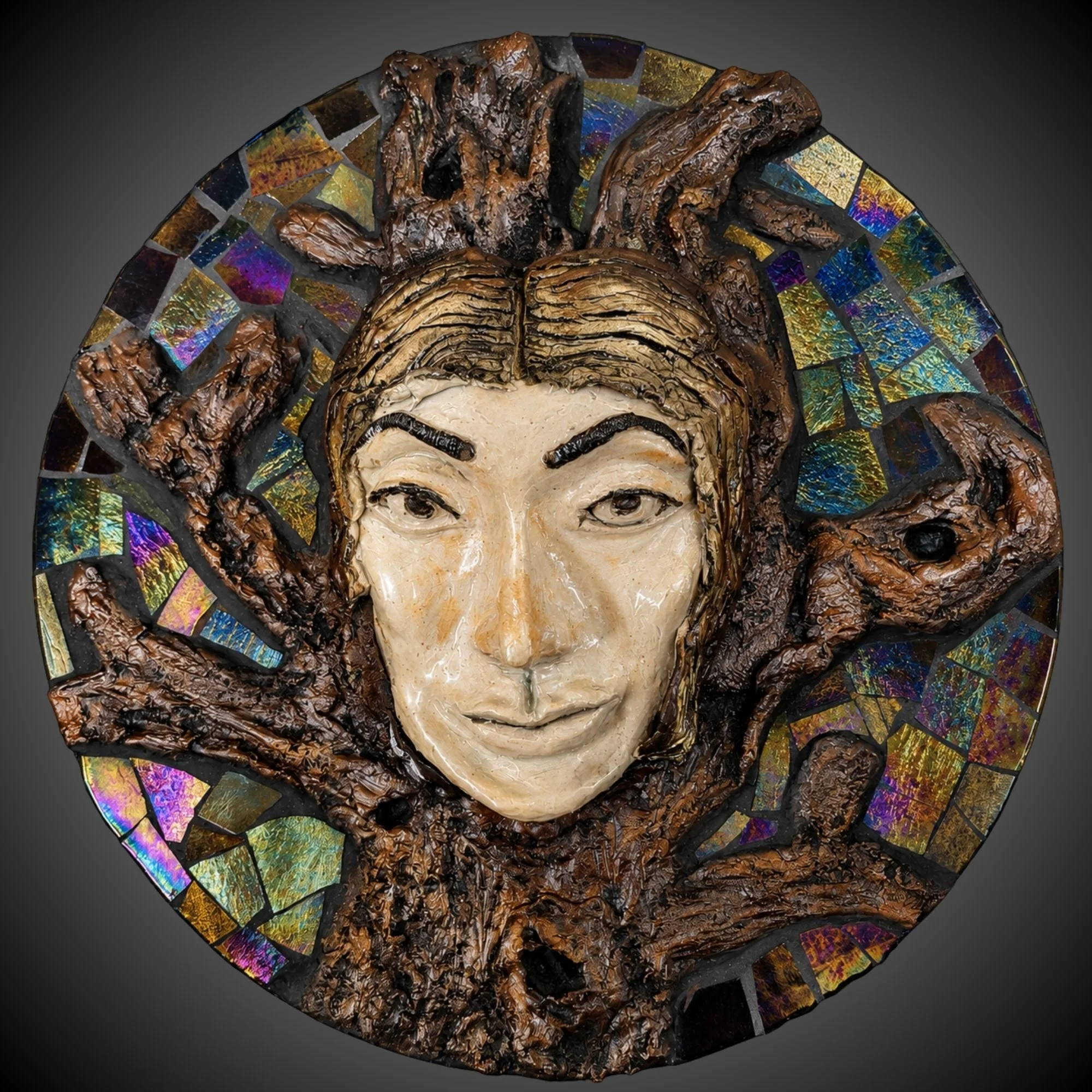 Saturn (Strength), ceramic face with stained-glass mosaic
