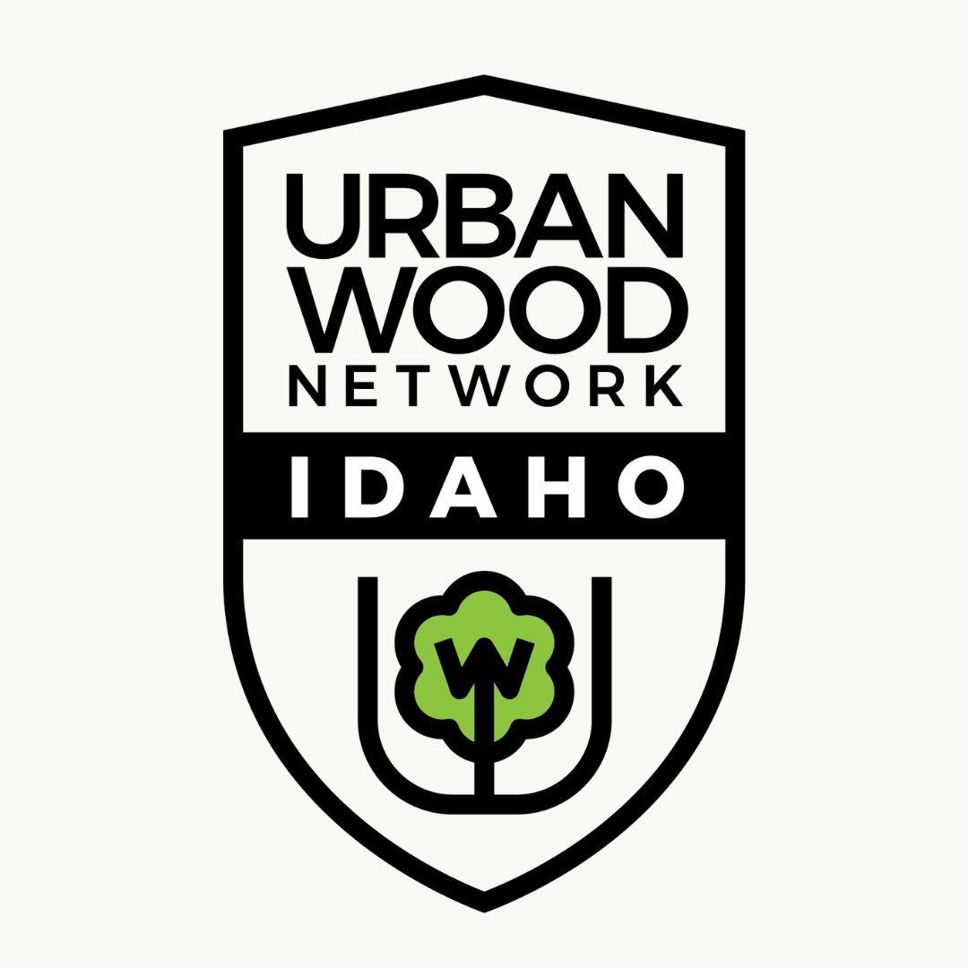 A badge featuring the words 'Urban Wood Network Idaho' with a green tree icon and a 'W' inside it.