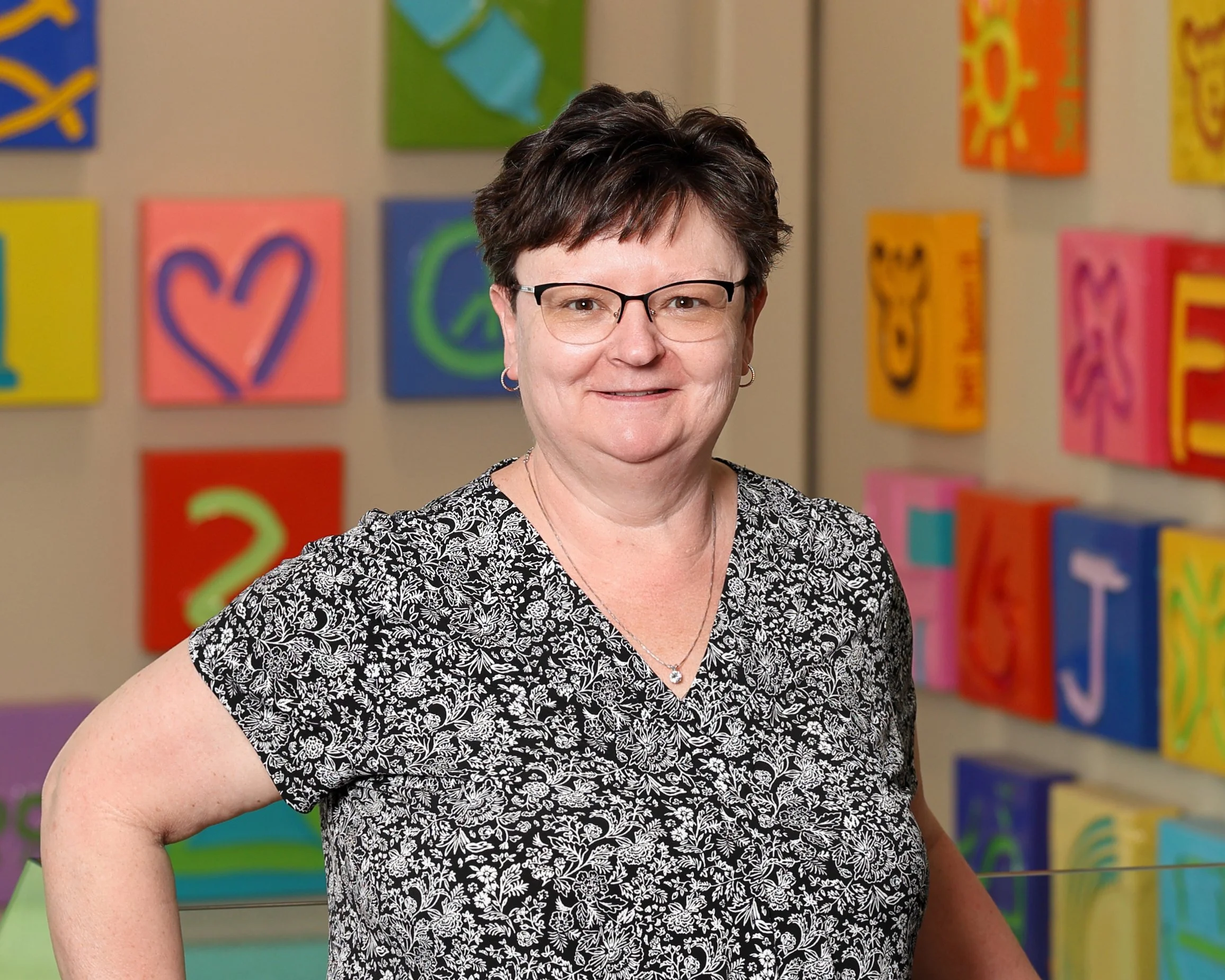 Professional headshot of Penny Mann