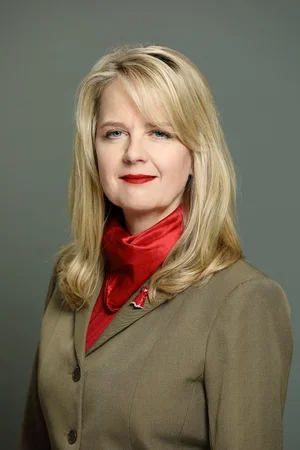 Professional headshot of Michelle Dew