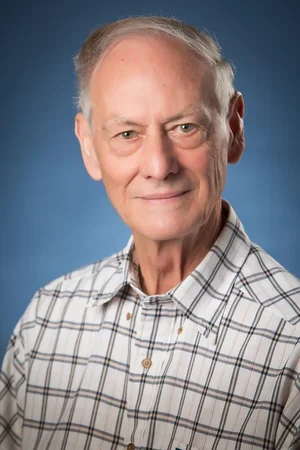 Professional headshot of David Newcomer, IV