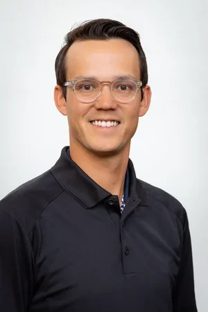 Professional headshot of Brandon Cusick