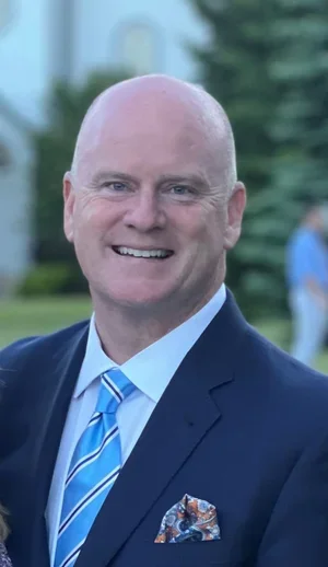 Professional headshot of Scott Thompson