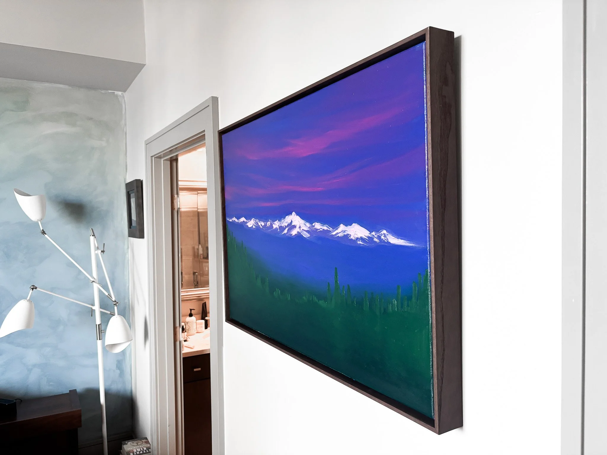 Framed painting of the cascade mountains