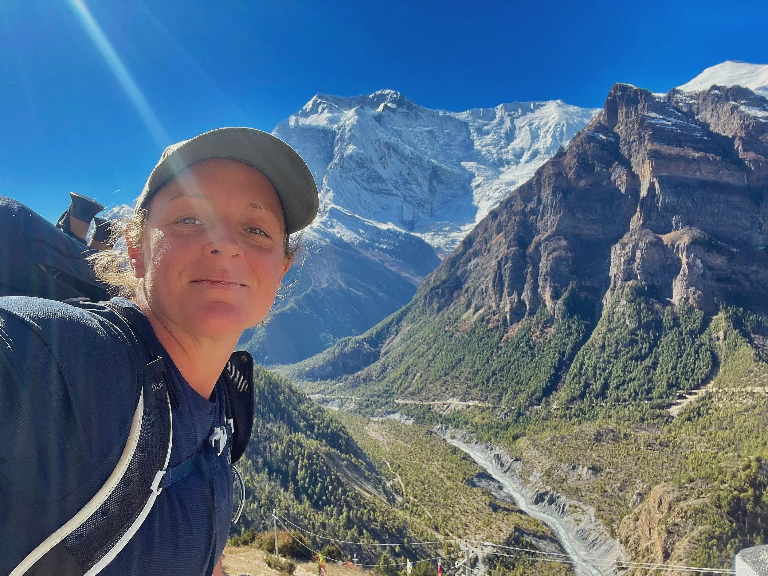 Artist Cat Goward trekking in the Himalayas