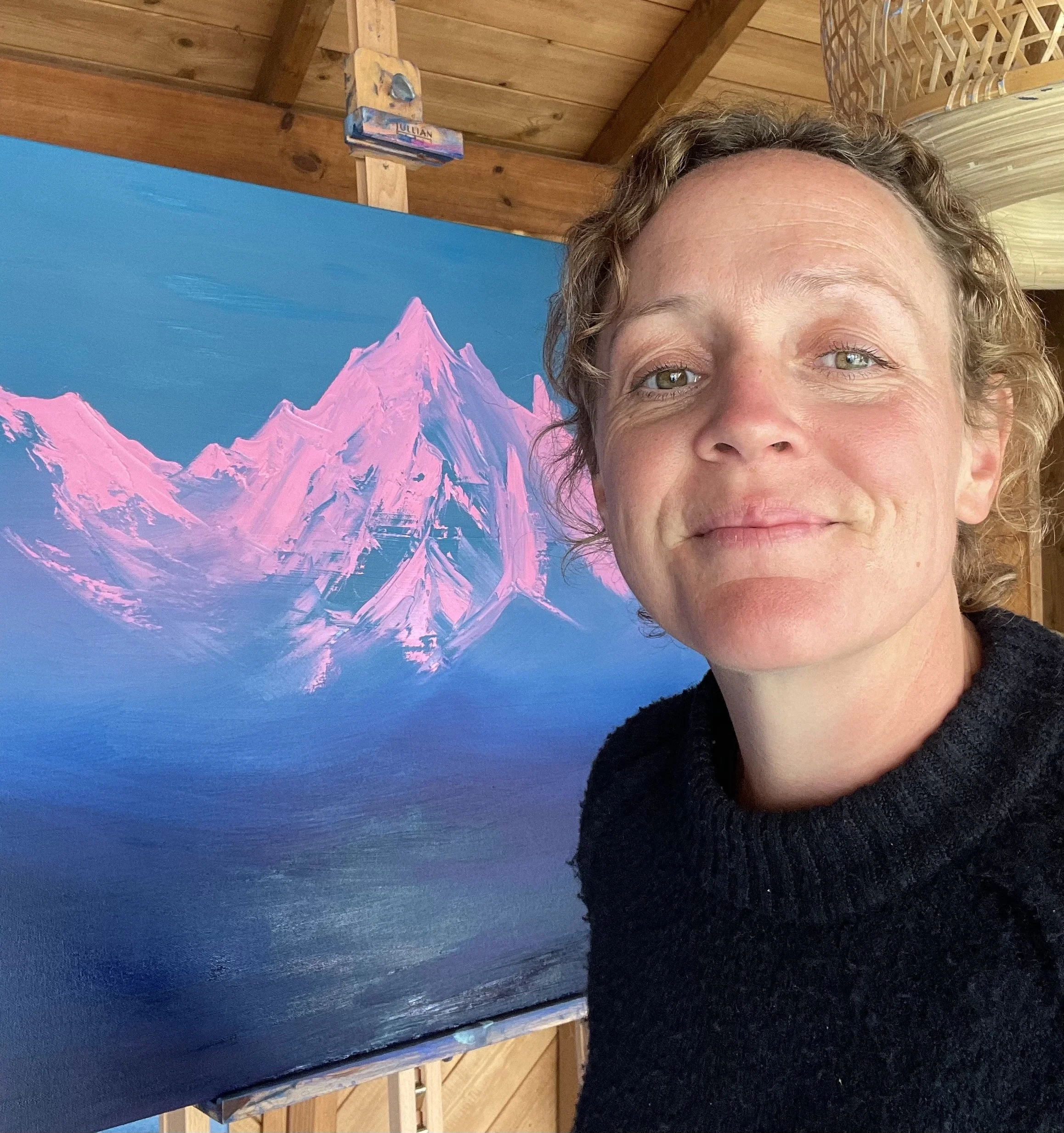 Artists Cat Goward painting in her studio Mount Kenya