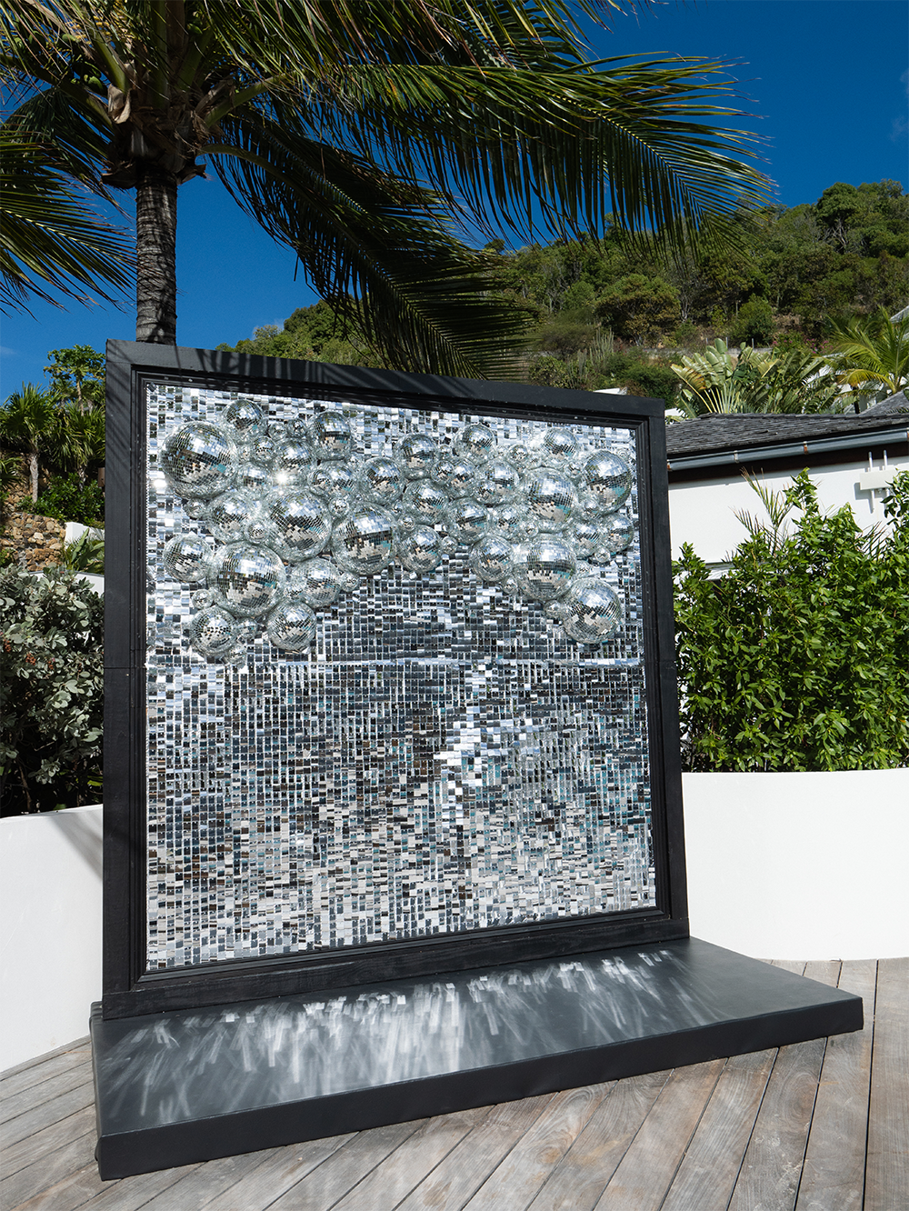 Silver reflective wall used as event decor for a glamorous celebration in St Barth.