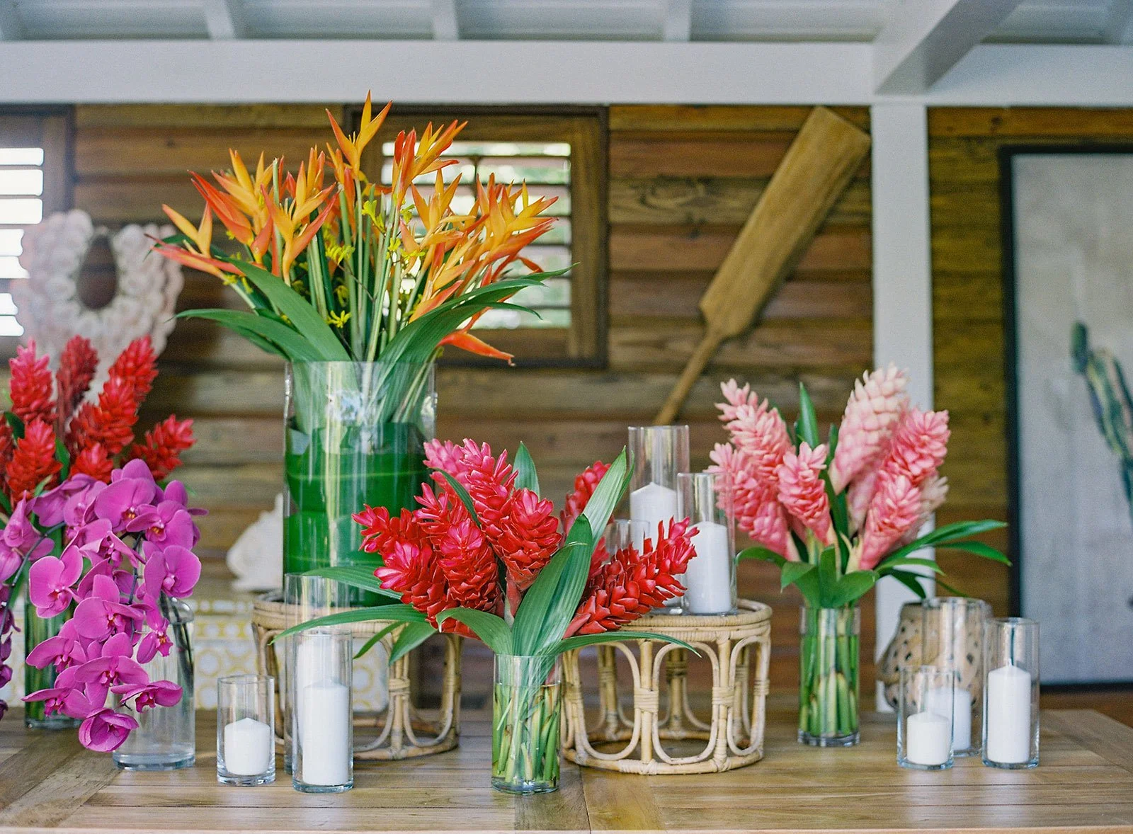 Rustic tropical wedding table decorated with exotic flowers and natural materials in St Barth.