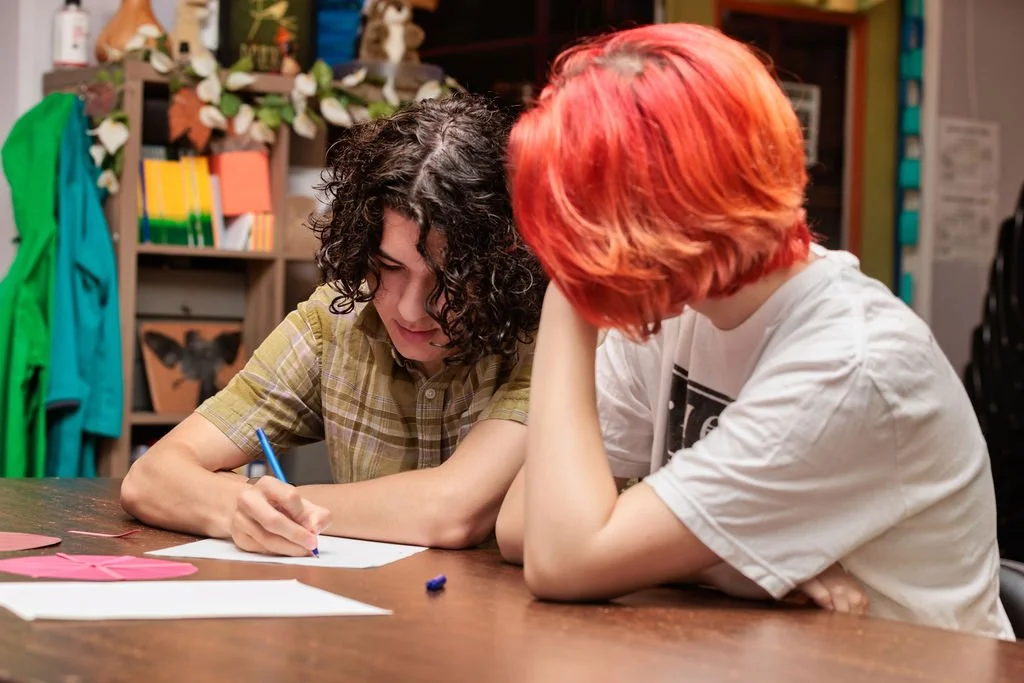 high school students studying together