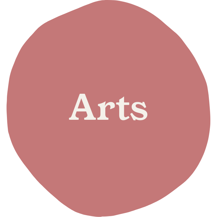 A pink circular shape with the word 'Arts' written in white text in the center.