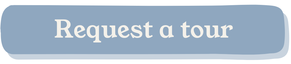 Light blue button with white text that reads "Request a tour".