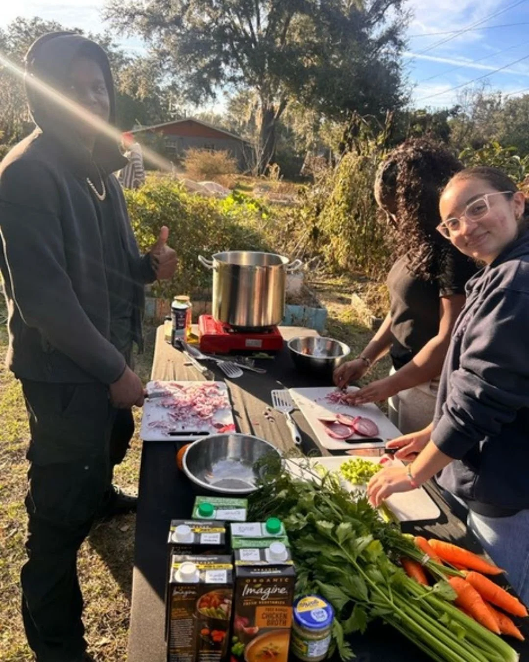 Volunteer Angela (right) at one of our youth gardens
