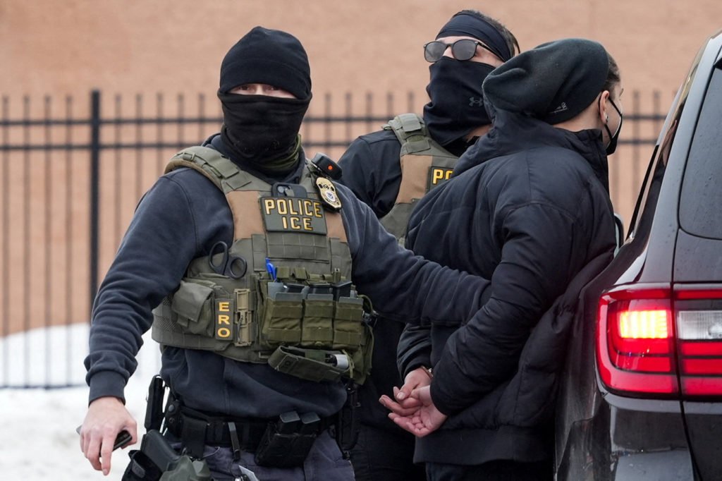 Members of U.S. Immigration and Customs Enforcement detain an observer, who was later released, as part of President Donald's Trump's immigration policy, in Minneapolis on Jan. 6, 2026. Photo by Tim Evans/ Reuters